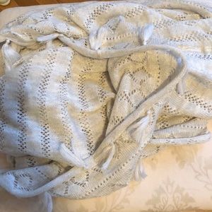 Cream infinity scarf with tassels